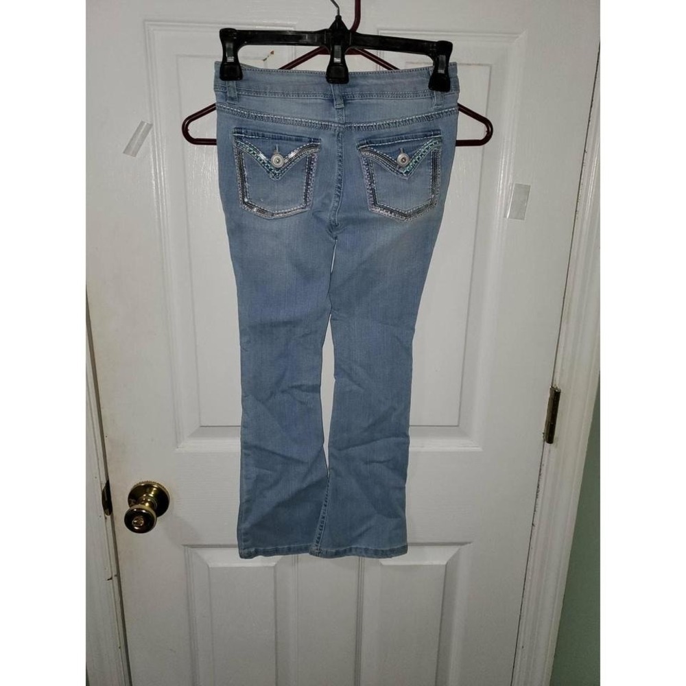 Squeeze Jeans Size 7 mid-rise slight flare